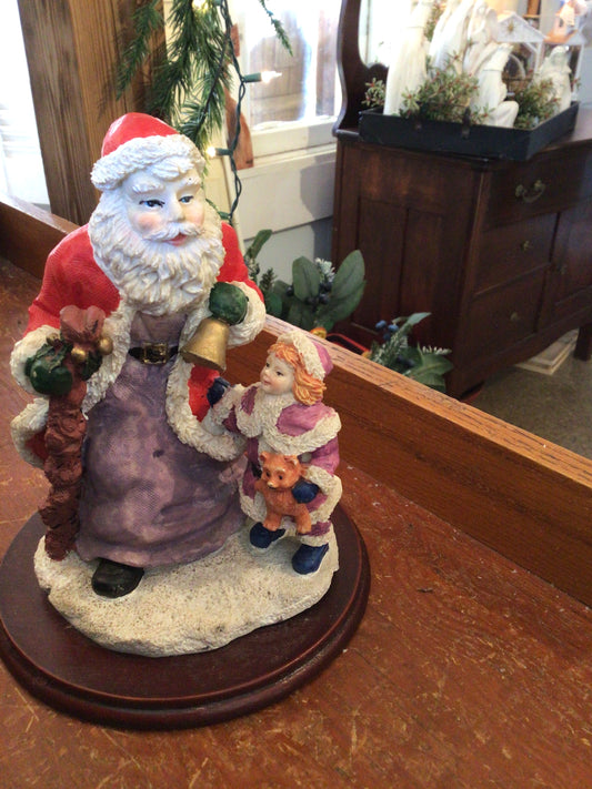 Santa and girl figure